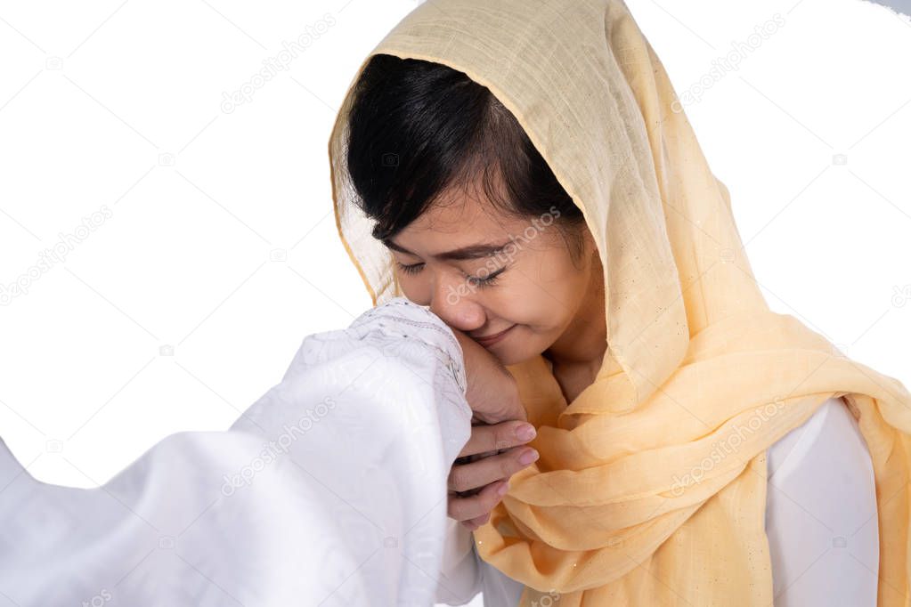 muslim woman hand touching shake hand