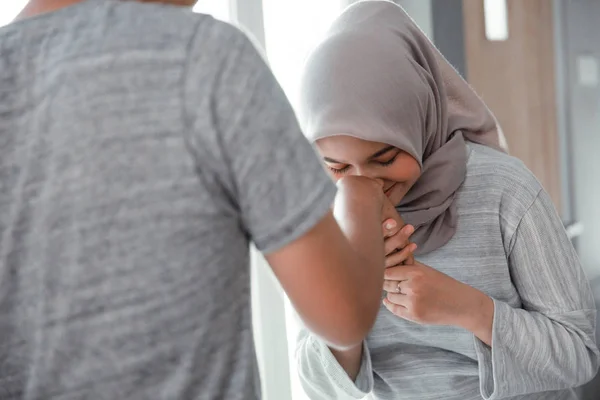 Woman shake hand and kiss her husbands hand — Stock Photo, Image