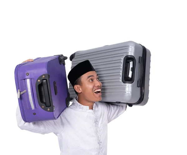 Muslim male carrying suitcase for eid mubarak celebration — Stock Photo, Image