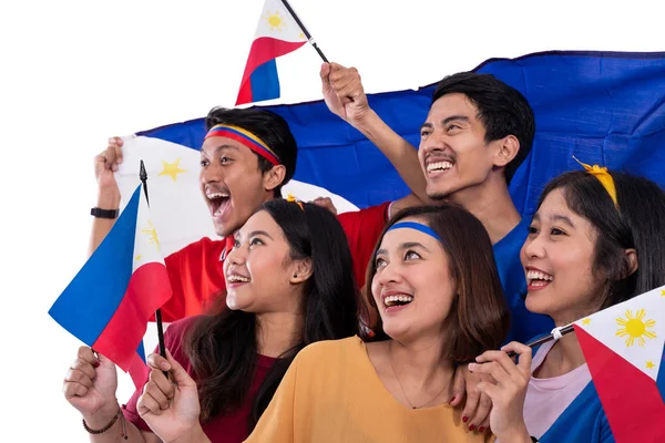 Excited asian young supporter holding philippines flag — Stock Photo, Image