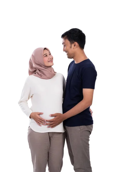 Romantic couple when wife pregnant with isolated background — Stock Photo, Image