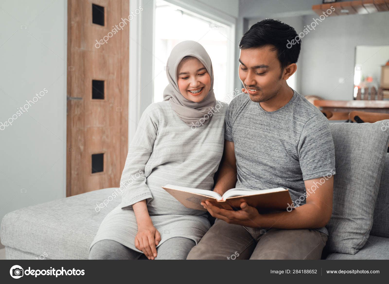 Wife And Husband Learn How To Read Qoran Stock Photo C Odua
