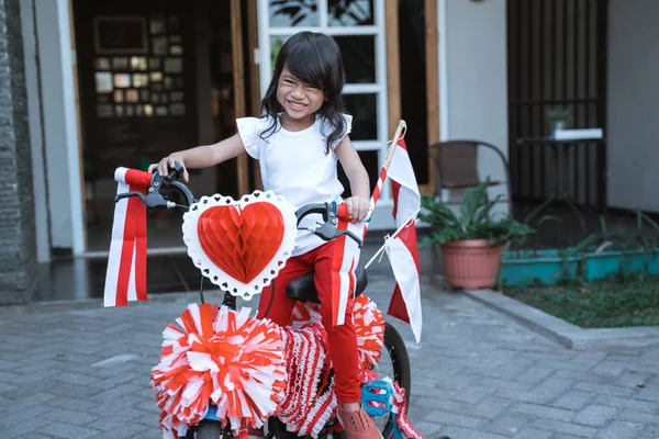 decorating bicycle for indonesia independence day celebration