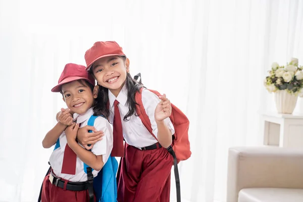 Lovely two elementary student smiling to camera — Stock Photo, Image