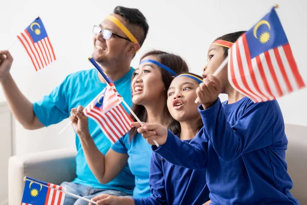 Family and son celebrating malaysia merdeka or malaysian independence day —  Stock Photo © odua #295041470