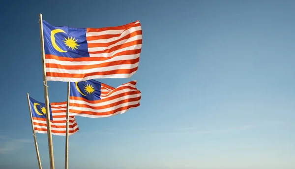 Malaysia flag under blue sky — Stock Photo, Image