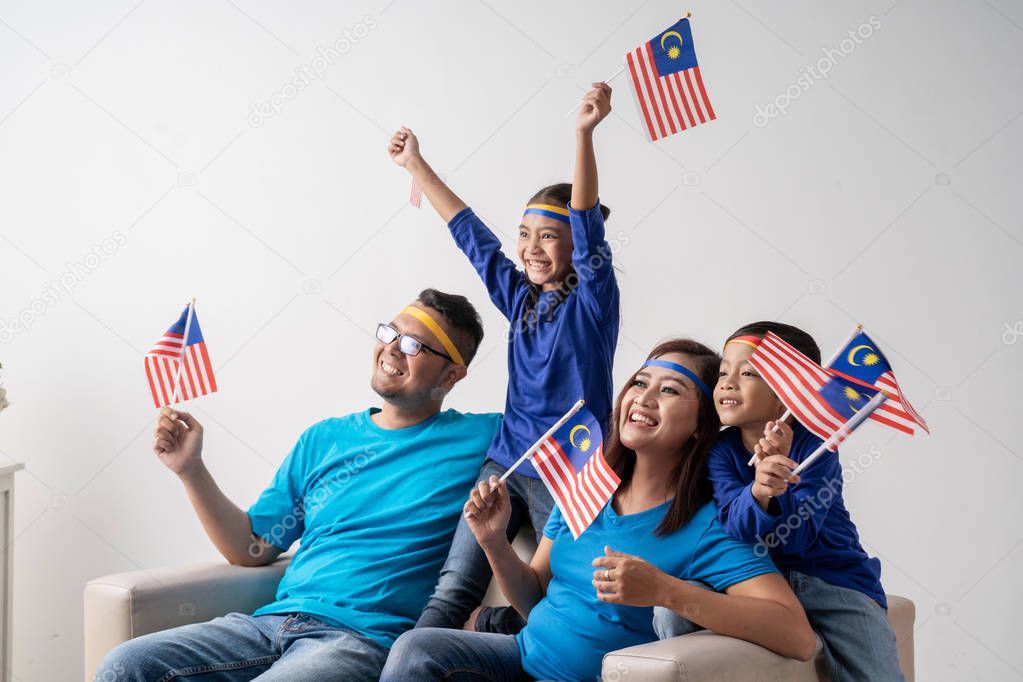 excited malaysian sport fans supporter