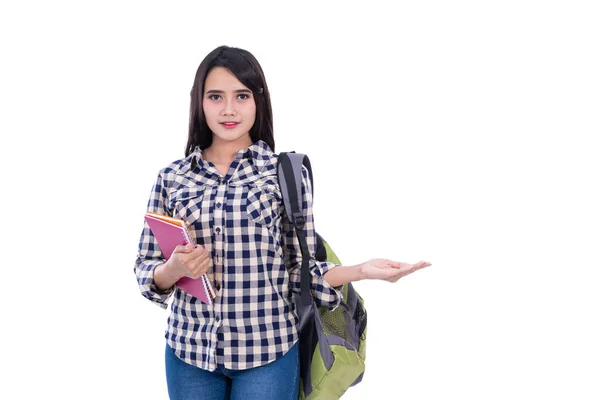 Estudiante universitario sosteniendo libro con mano presente —  Fotos de Stock