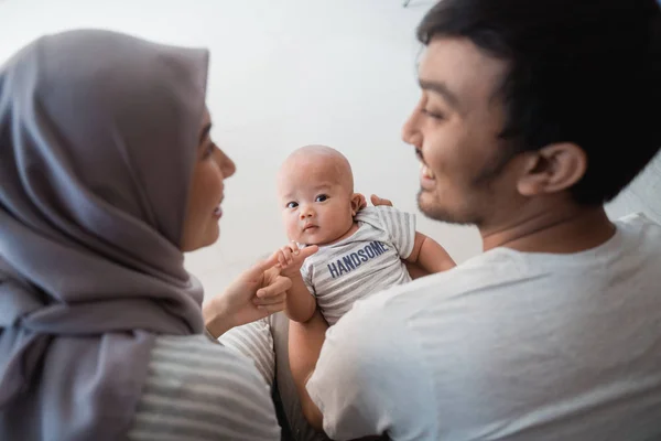 Asian family with infant son together smiling — Stock Photo, Image