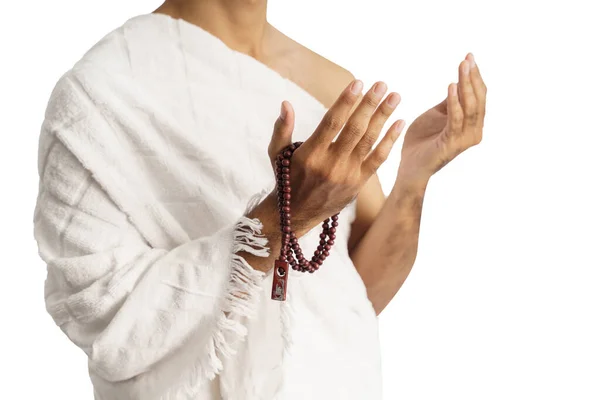 Muslim man praying wearing ihram isolated — Stock Photo, Image