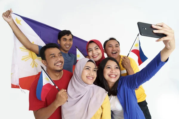 Filipino supporter taking selfie self portrait together — Stock Photo, Image