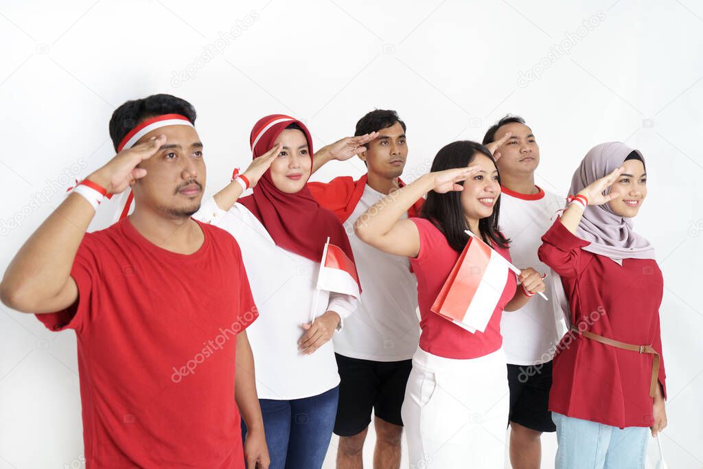 indonesian people on flag ceremony giving salute