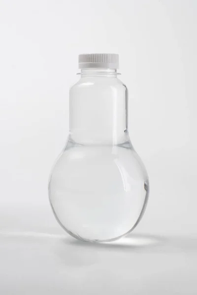 Liquid product on blank plastic container bottle — Stock Photo, Image