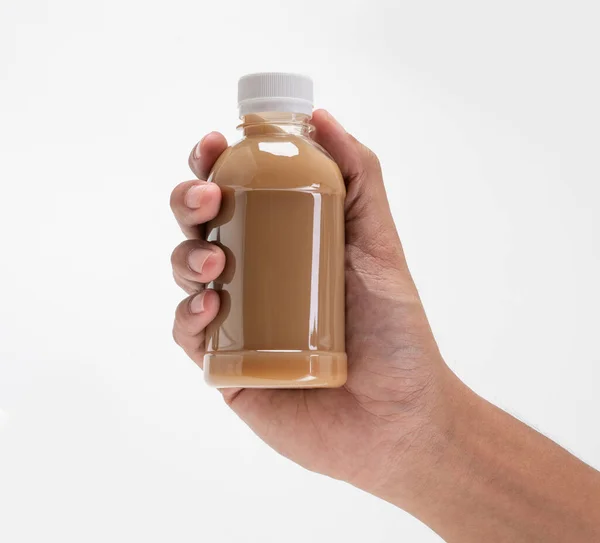 Mão segurando garrafa de plástico produto mockup — Fotografia de Stock