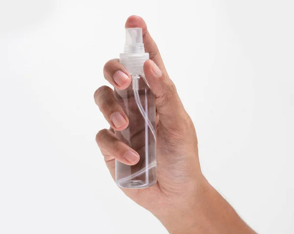 Flüssiges Produkt auf leerer Plastikflasche — Stockfoto