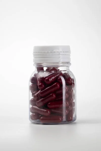 Caplets medicine bottle isolated on white — Stock Photo, Image