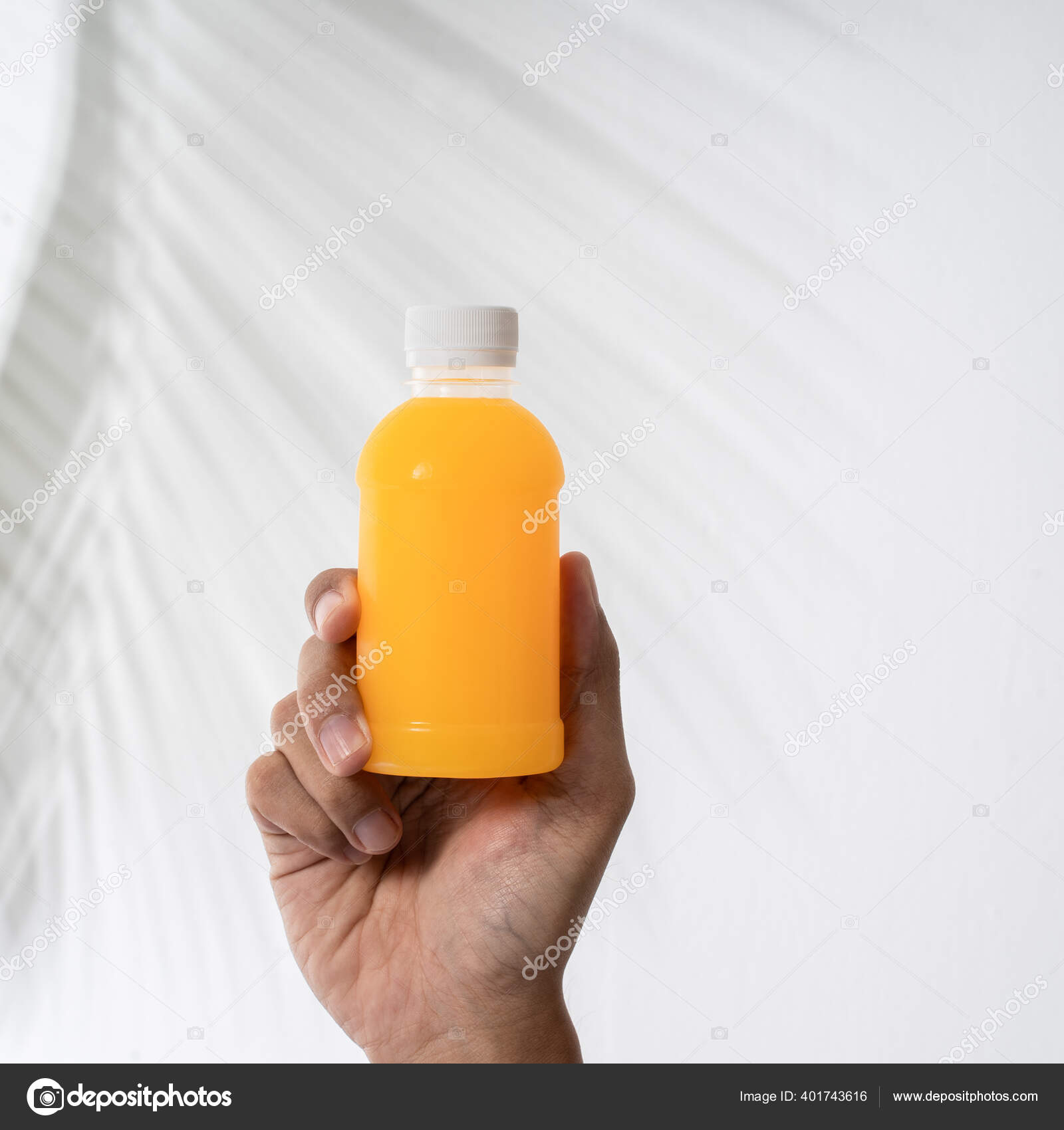 Download Hand Holding Beverage Product On Plastic Bottle Mockup Stock Photo Image By C Odua 401743616