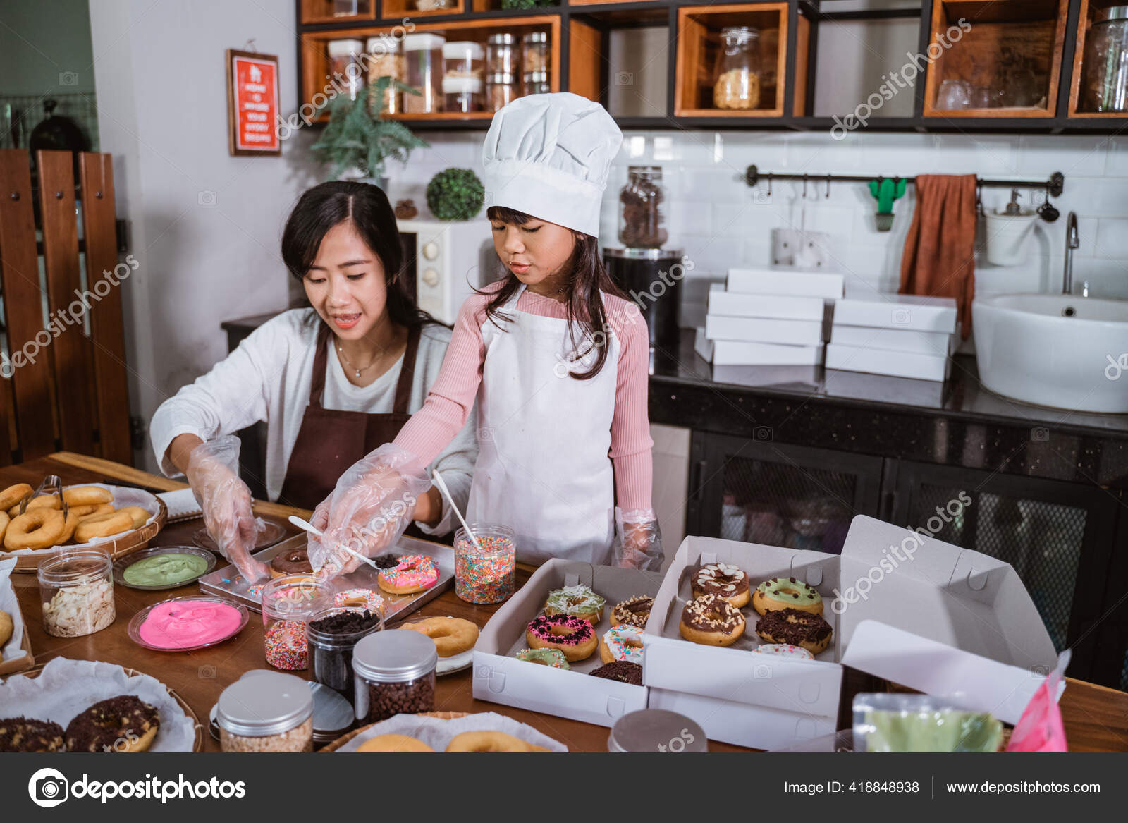 Personal Perspective Of Mother Making For Her Children Donuts With A Donut  Maker High-Res Stock Photo - Getty Images