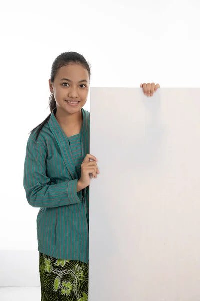 Beautiful girl holding empty white board — Stock Photo, Image