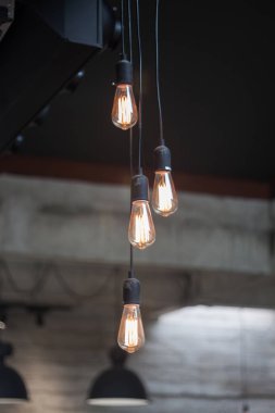 Decorative light bulbs in modern style, stock photo clipart