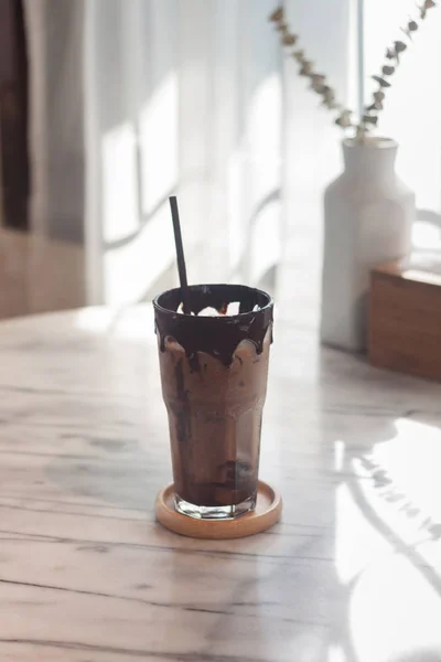 Ice coffee on wooden table — Stock Photo, Image