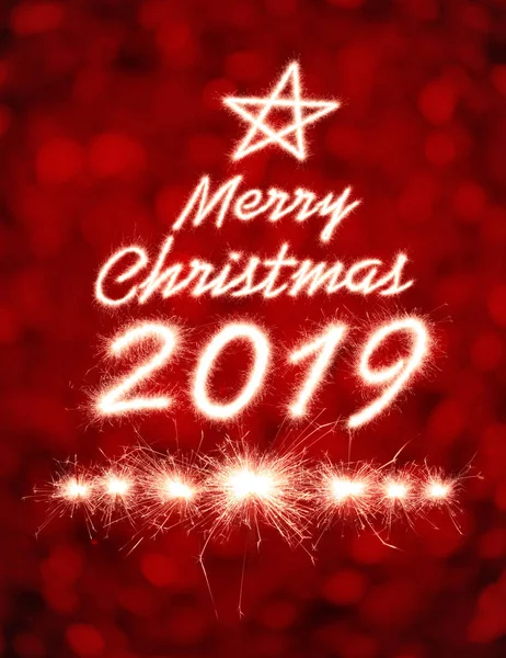 Veselé Vánoce 2019 Psaný Jiskrou Ohňostroj Nad Světlem Bokeh — Stock fotografie