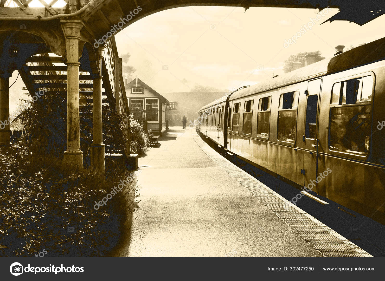 Film black and white steam train and carraiges on the platform a