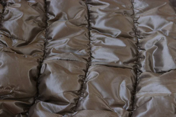 Texture concept - close up of crumpled brown metallic fabric background — Stock Photo, Image