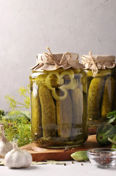 Marinated Cucumbers Garlic Pepper Dill Two Glass Jars Light Grey — Stock Photo, Image