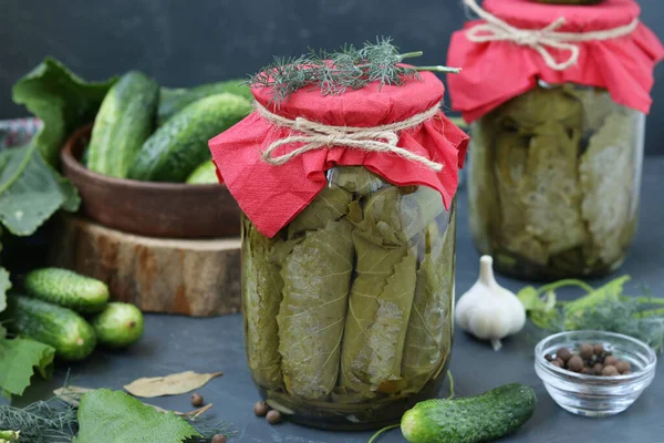 Marinated Cucumbers Grape Leaves Garlic Dill Two Glass Jars Dark — Stock Photo, Image