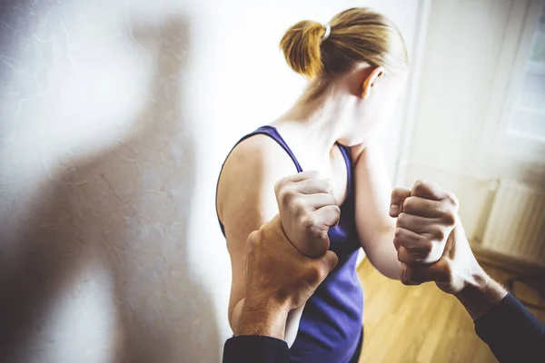 Girl trying to escape from domestic violence — Stock Photo, Image