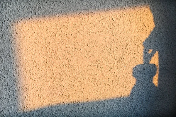 Schatten an der Wand bei Sonnenaufgang. Malaga. Andalusien. Spanien — Stockfoto