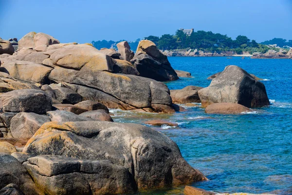 Seascape with huge pink granite boulders near Plumanach. The coa Royalty Free Stock Images