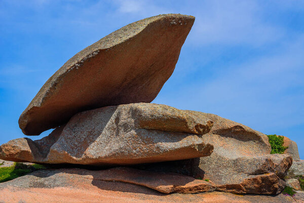 Granite pink boulders near Plumanach. The coast of Pink Granite 