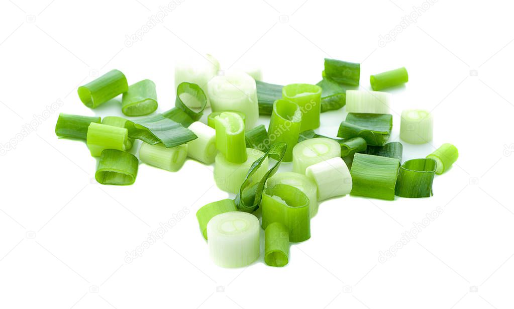 Chopped fresh green onions isolated on white background. Top view