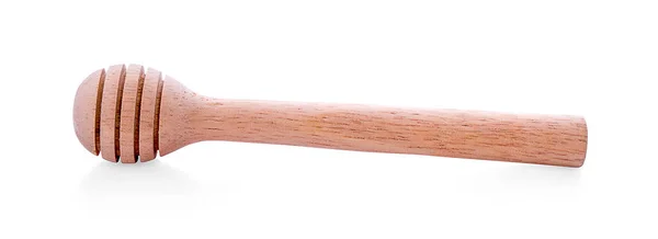 Legno mescolare bastone con miele isolato su sfondo bianco . — Foto Stock