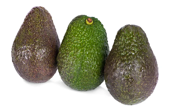 Avocado mit Avocadoblatt isoliert auf weißem Hintergrund. — Stockfoto