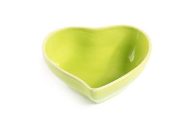 Beyaz arkaplanda izole edilmiş yeşil seramik kase