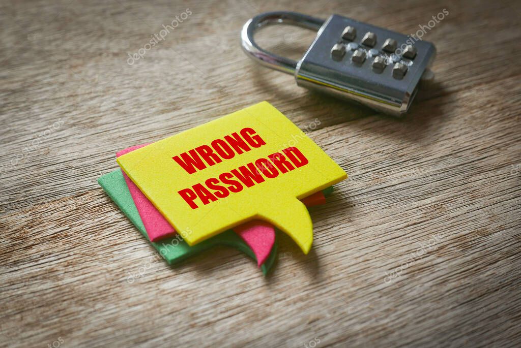 A silver steel numbering padlock with a stack of colorful speech bubbles written with Wrong Password on wooden background.