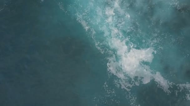 Aerial top view of ocean waves breaking on dark rocks, Canary Islands, Tenerife, Spain — Stock Video