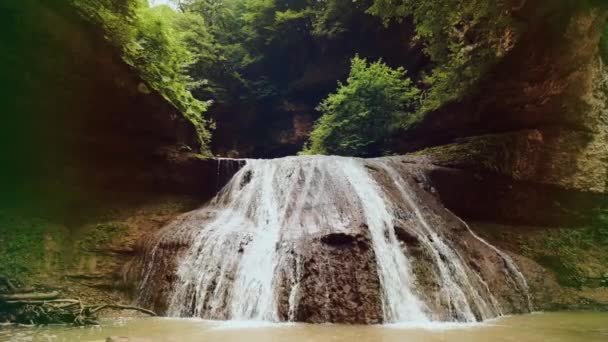 Steadicam tracking shot of beautiful waterfall Rufabgo in North Caucasus in Adygea, Caucasian Mountains, Russia. Slow motion — Stock Video