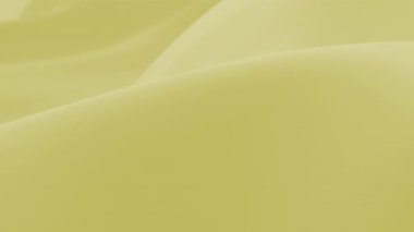 Soyut hassasiyet sarı ipek arka plan lüks dalga kumaş saten renkli kumaş. Şatafatlı bakım sıvısı sıçraması, dalgalı sıvı dokusu. Çırpınan maddeler. 3B animasyon hareketi tasarımı duvar kağıdı
