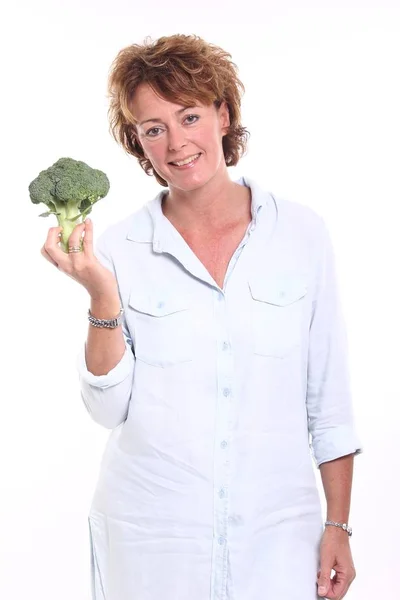 Donna Che Tiene Broccoli Mano — Foto Stock