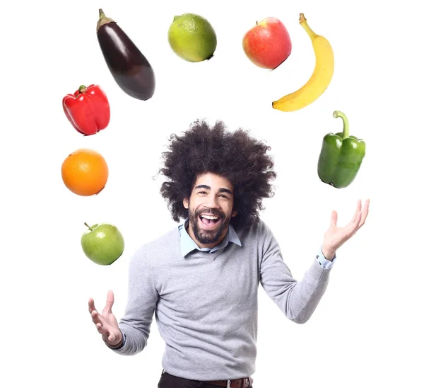 Hombre Afroamericano Hace Malabares Con Diferentes Frutas Verduras —  Fotos de Stock