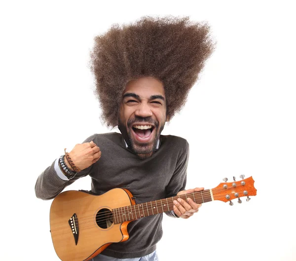 Black man playing guitar on white background