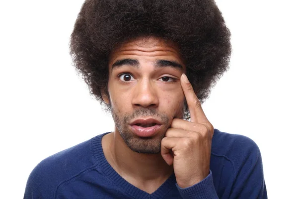 Hombre Negro Tocando Ojo Sobre Fondo Blanco —  Fotos de Stock