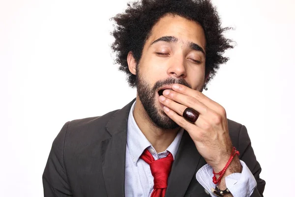 Durmiendo Hombre Negro Sobre Fondo Blanco —  Fotos de Stock