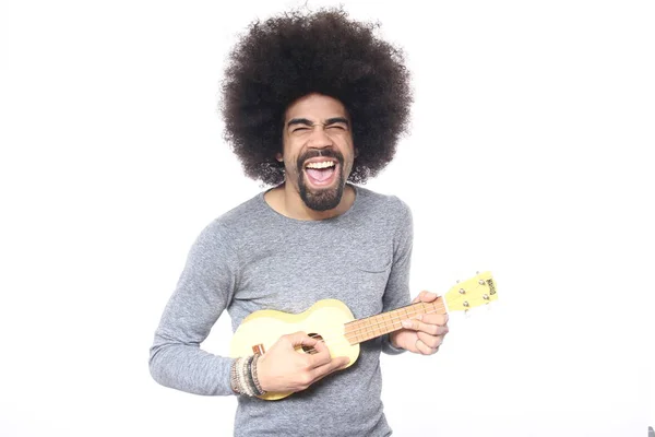 Hombre Negro Tocando Pequeña Guitarra —  Fotos de Stock