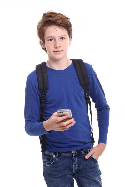 Beautiful teenage boy with mobile phone
