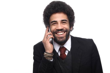 İş adamı cep telefonuyla konuşuyor.